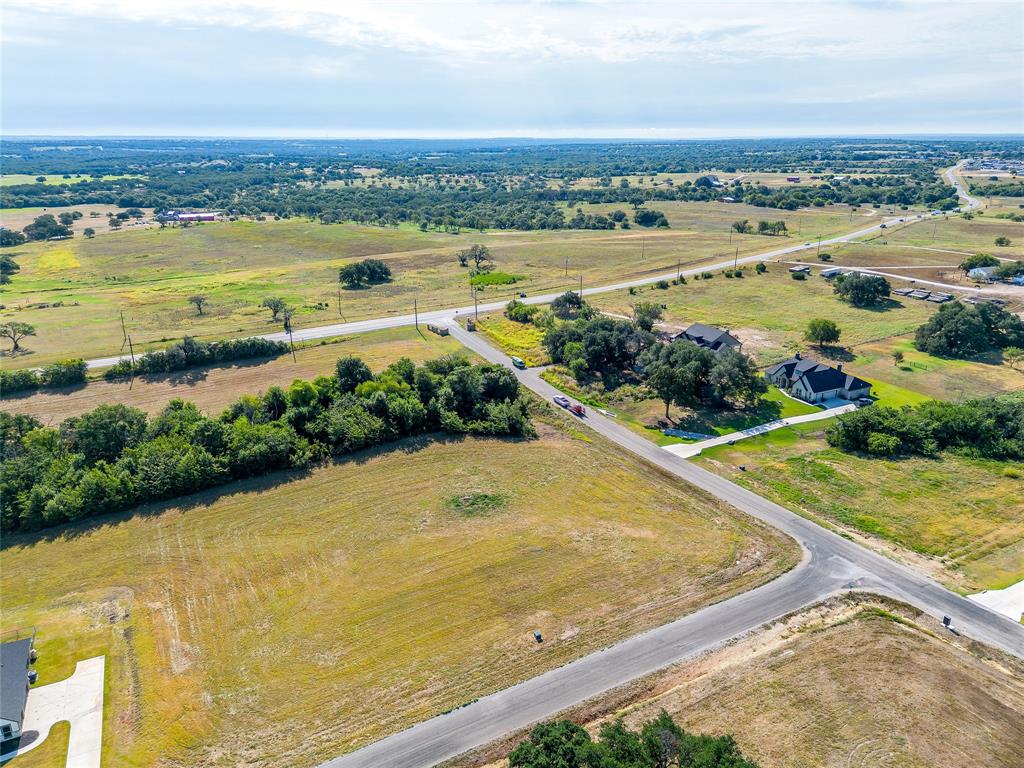 2004 Carrie Court Weatherford, TX 76088 - Photo 7 of 10 an aerial view of ocean and residential houses with outdoor space