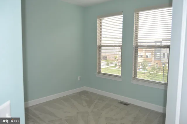 hallway view with cabinets