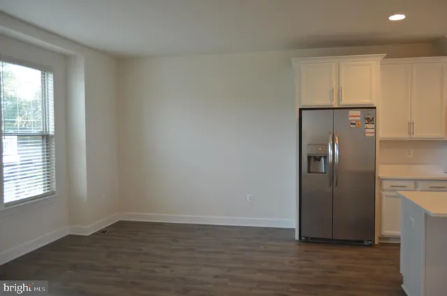 a bathroom with a shower and a sink