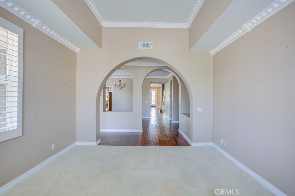 3782 Carson Way Yorba Linda, CA 92886 - Photo 12 of 48 a view of a livingroom with wooden floor and a large window