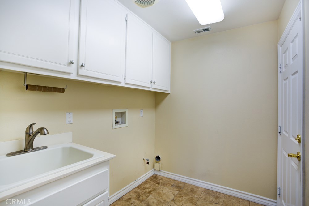 3782 Carson Way Yorba Linda, CA 92886 - Photo 20 of 48 a bathroom with a sink and cabinets