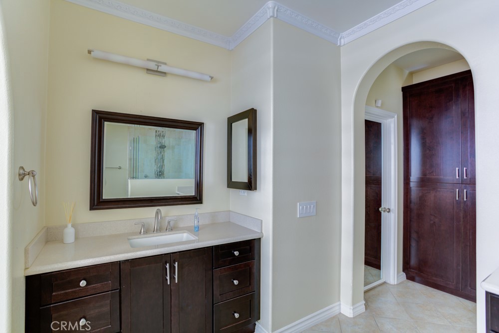 3782 Carson Way Yorba Linda, CA 92886 - Photo 29 of 48 a bathroom with a double vanity sink and a mirror