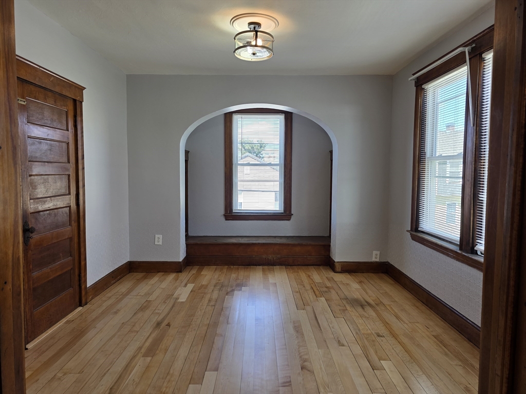 2 Hillside Street, Unit 3 Worcester, MA 01610 - Photo 16 of 23 a view of livingroom with hardwood floor and hallway