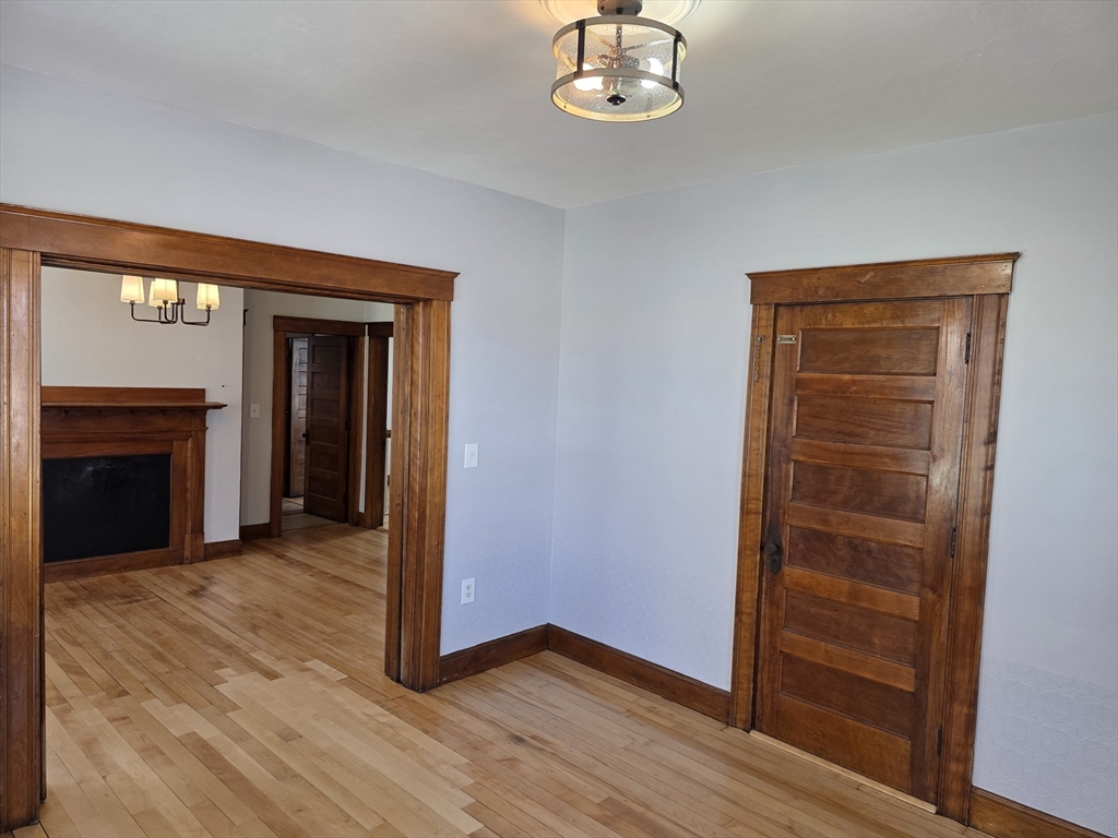 2 Hillside Street, Unit 3 Worcester, MA 01610 - Photo 17 of 23 a view of a livingroom with a fireplace