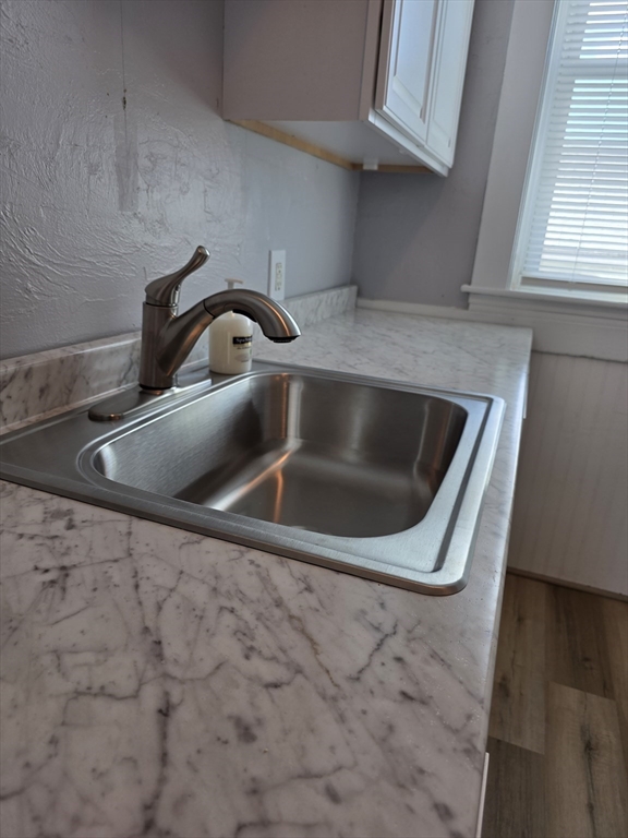 2 Hillside Street, Unit 3 Worcester, MA 01610 - Photo 4 of 23 a close view of sink and tap