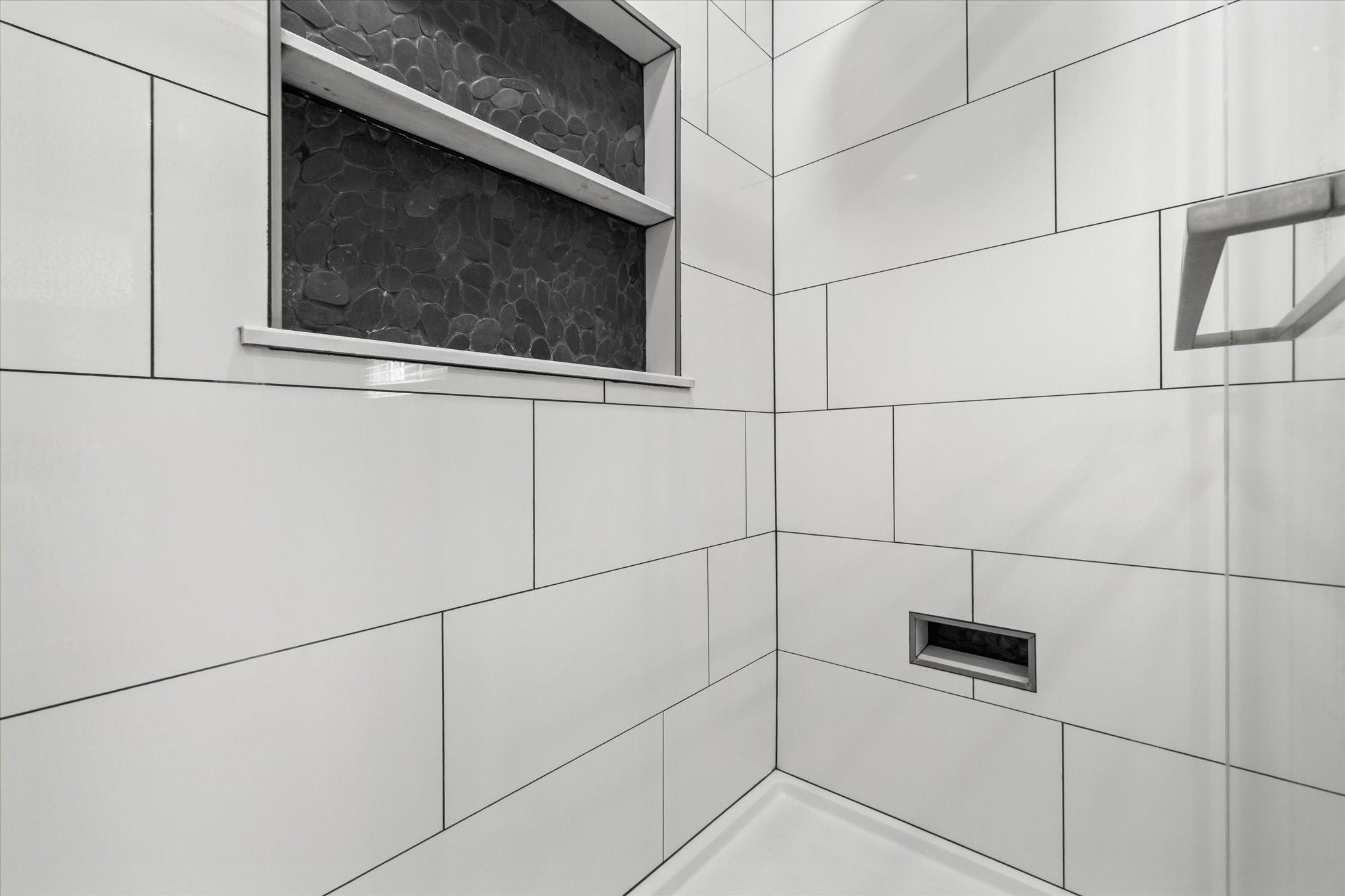 230 Richards Ferry Road Fredericksburg, VA 22406 - Photo 32 of 96 Sleek tiles, with soap/product nook and foot nook.