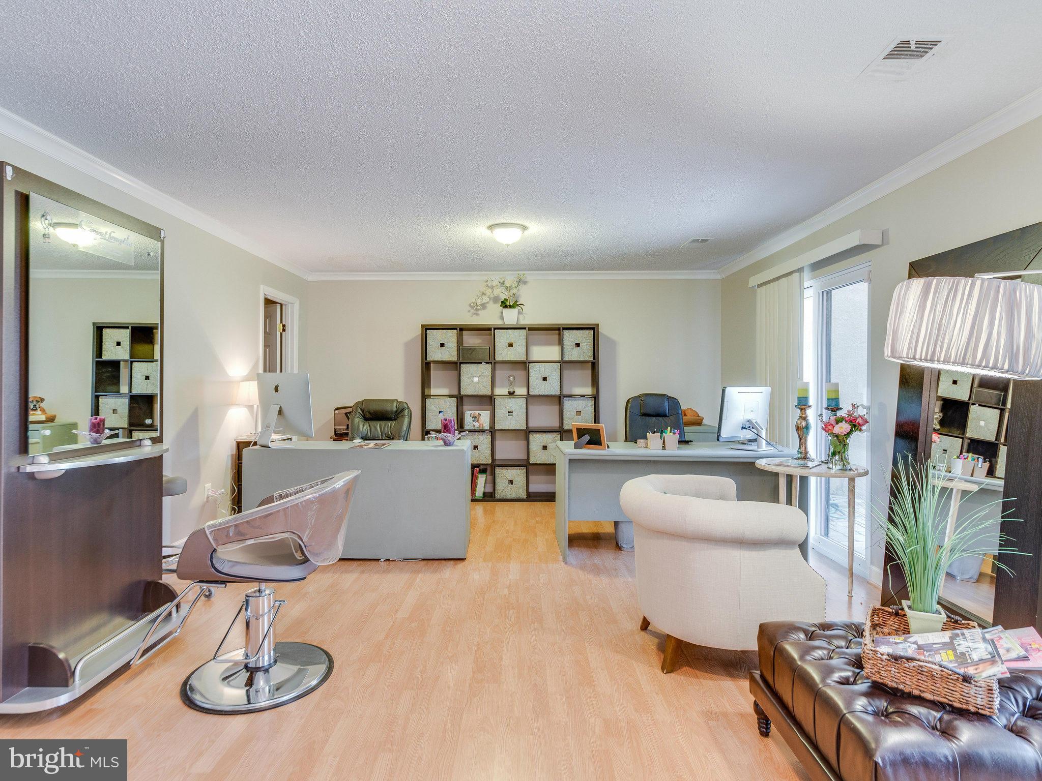 2269 Wheelwright Court Reston, VA 20191 - Photo 19 of 28 a living room with furniture and a wooden floor