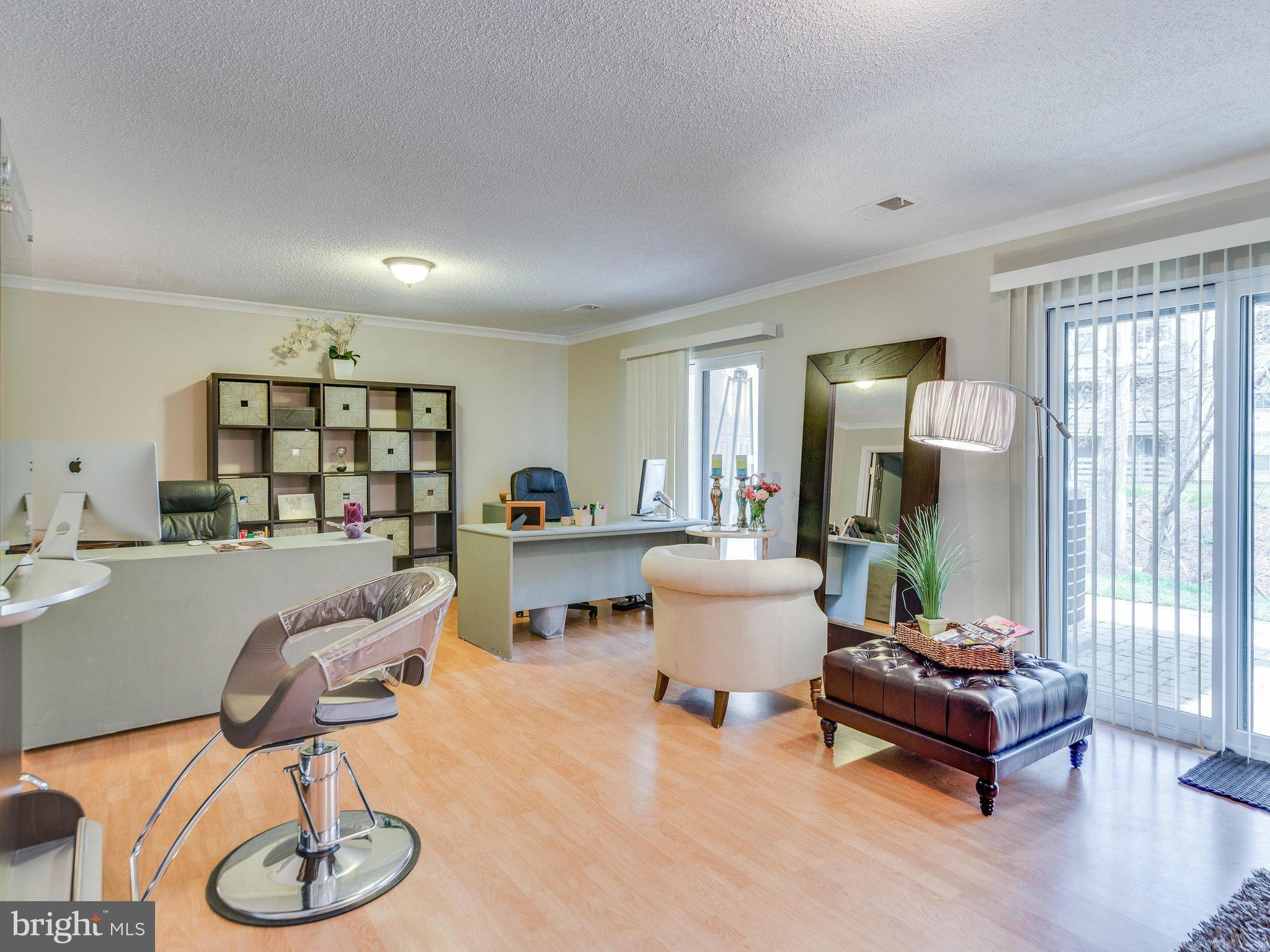 2269 Wheelwright Court Reston, VA 20191 - Photo 20 of 28 a living room with furniture and a wooden floor