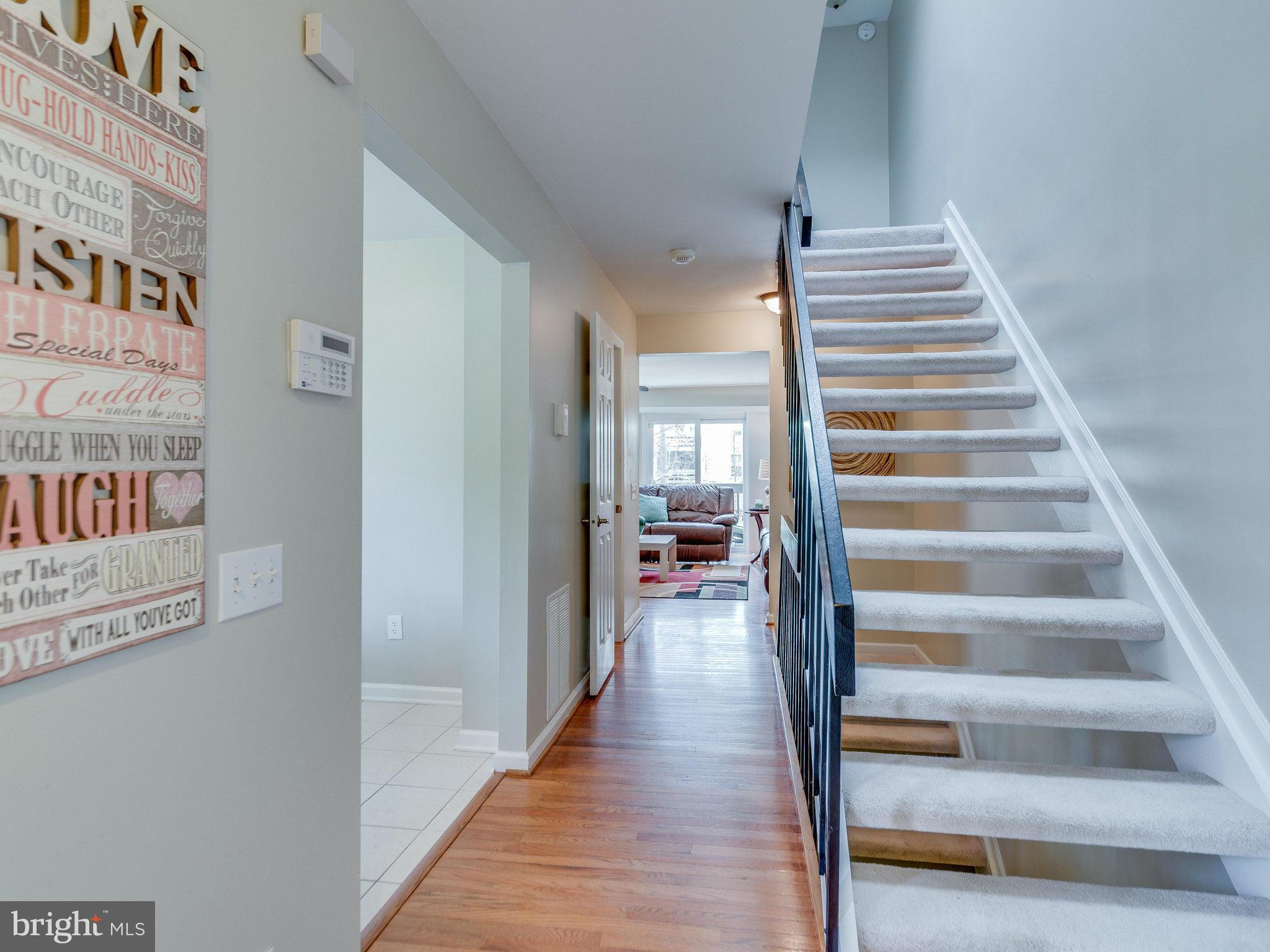 2269 Wheelwright Court Reston, VA 20191 - Photo 3 of 28 a view of staircase with white walls