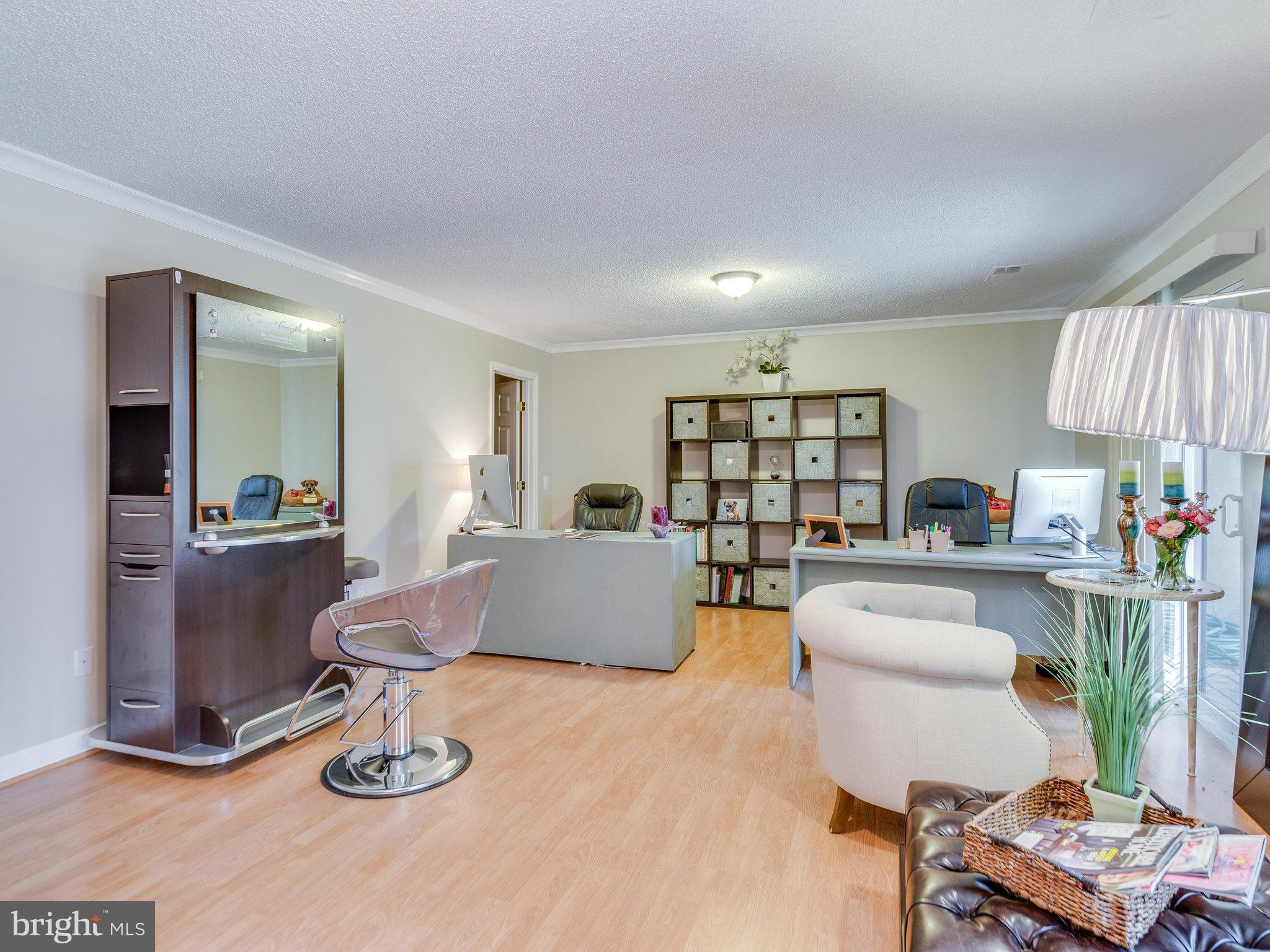 2269 Wheelwright Court Reston, VA 20191 - Photo 21 of 28 a living room with furniture and a wooden floor