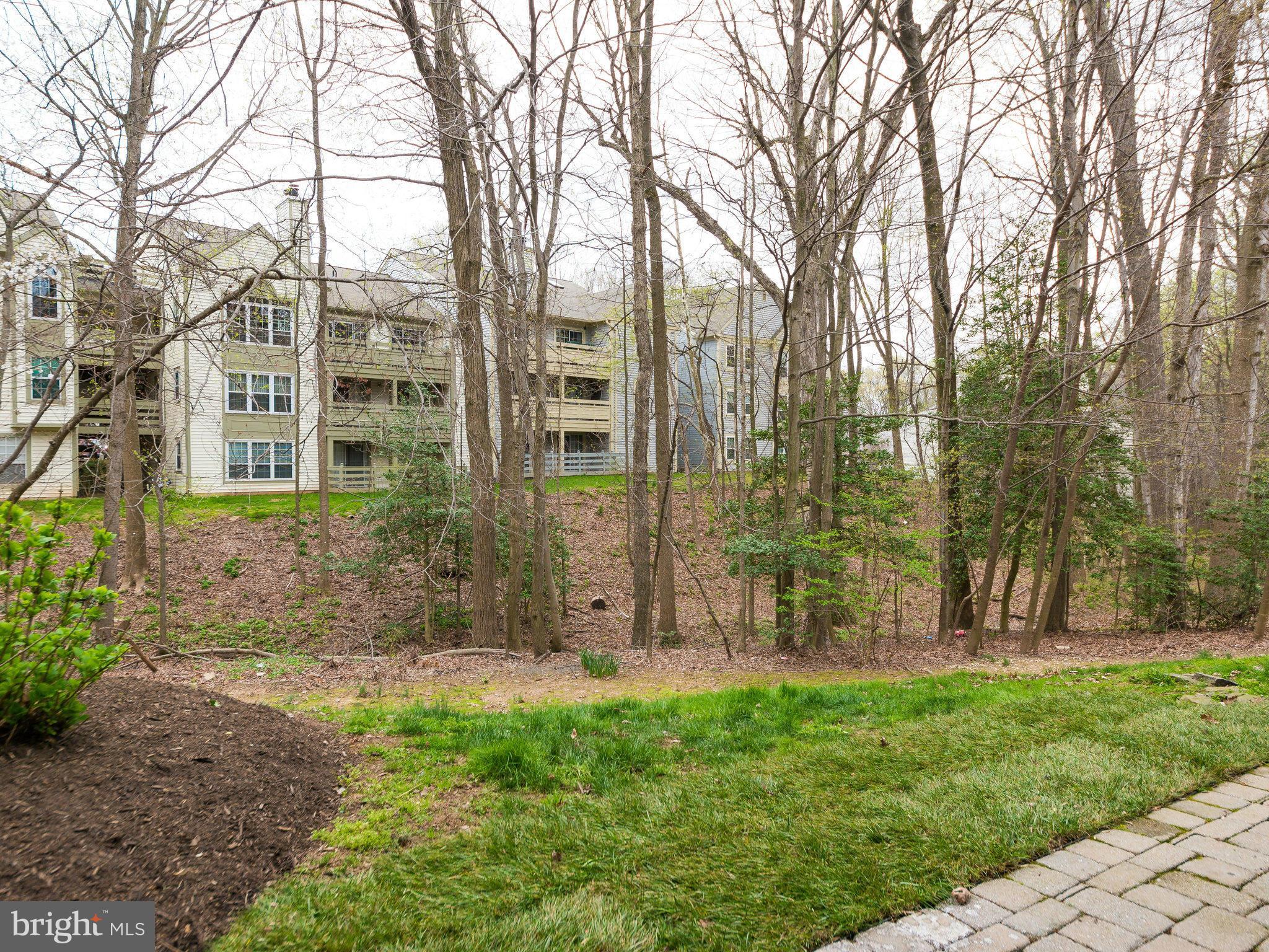 2269 Wheelwright Court Reston, VA 20191 - Photo 28 of 28 front view of a house with a yard