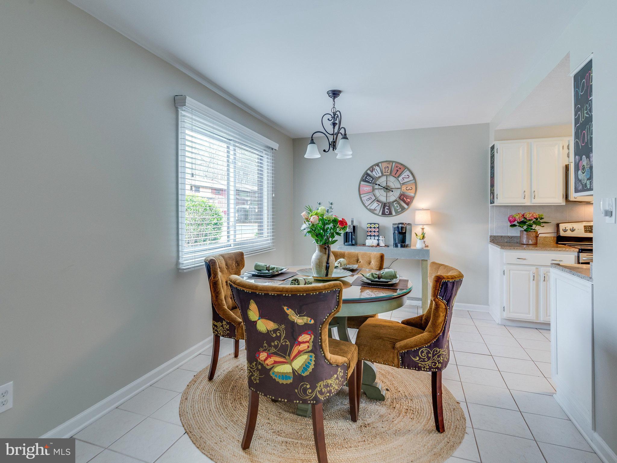 2269 Wheelwright Court Reston, VA 20191 - Photo 7 of 28 a view of a dining room with furniture and window
