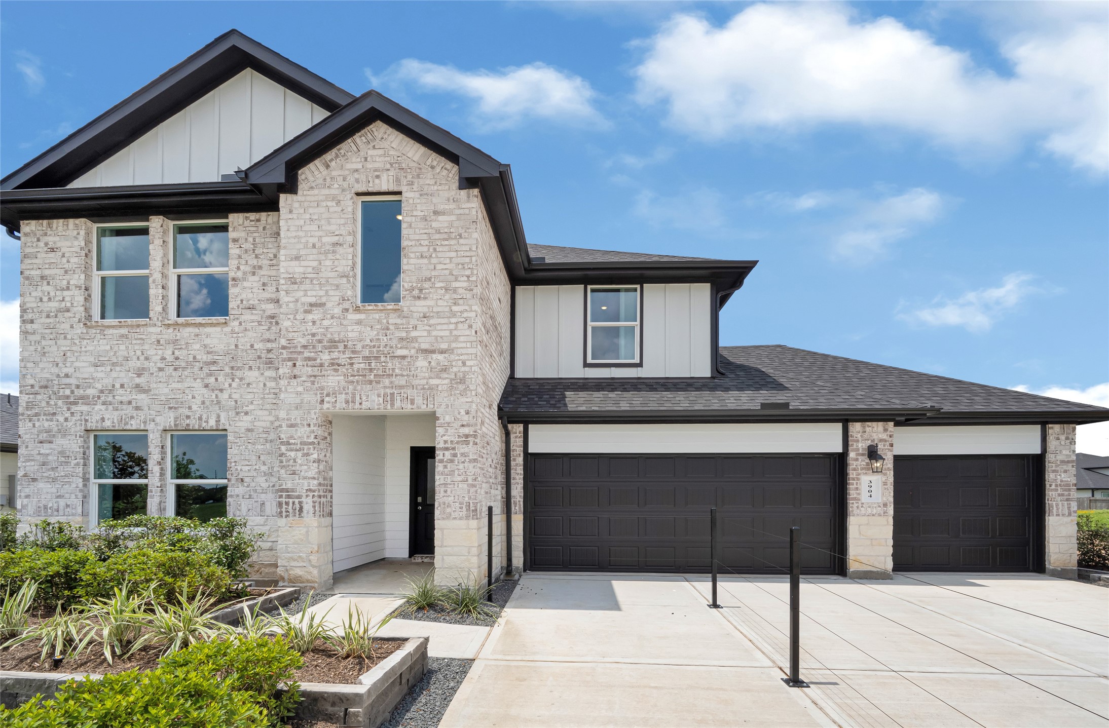 6204 Brookhaven Street Rosenberg, TX 77469 - Photo 2 of 33 a front view of a house with garage