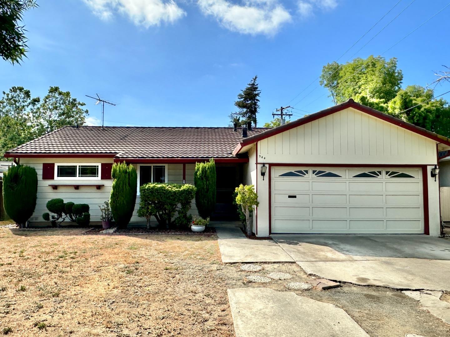 944 Robin Way Sunnyvale, CA 94087 - Photo 1 of 1 a front view of a house with a yard