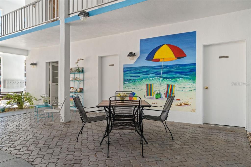300 Clyde Lane, Unit 215 Dunedin, FL 34698 - Photo 29 of 60 a view of a dining room with furniture