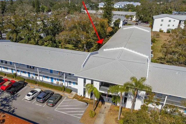 a bed room with furniture and a chandelier