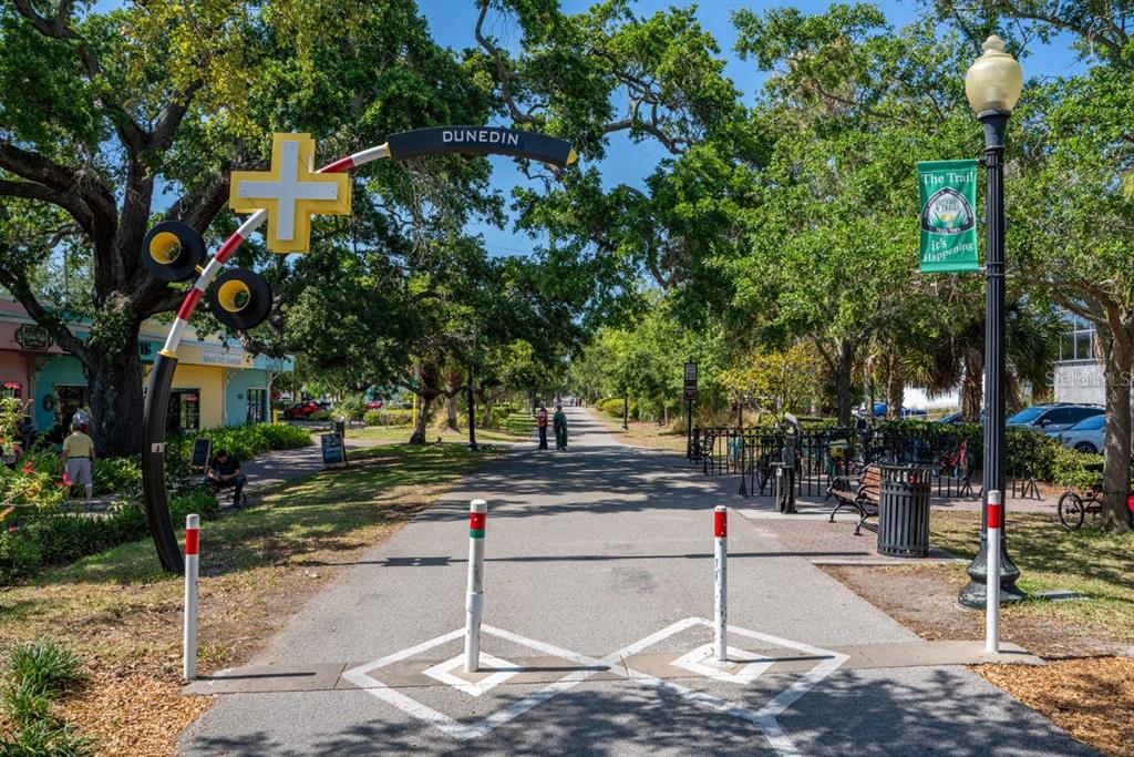 300 Clyde Lane, Unit 215 Dunedin, FL 34698 - Photo 47 of 60 a street sign on a side of building
