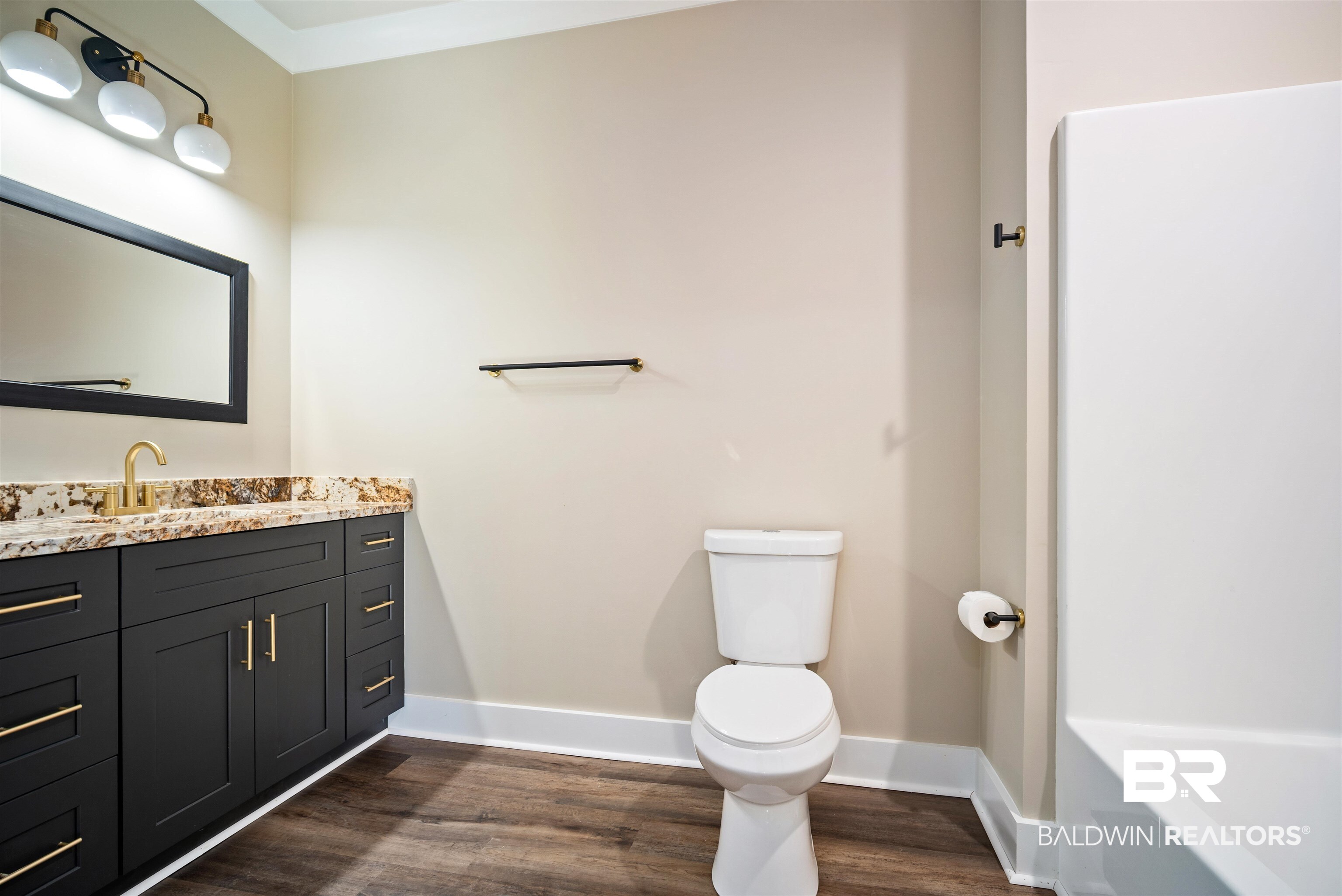 188 Hampton Ridge Mobile, AL 36608 - Photo 29 of 37 Bathroom #3 adjoining bedroom #4. Granite vanity and crown molding. LVP flooring.