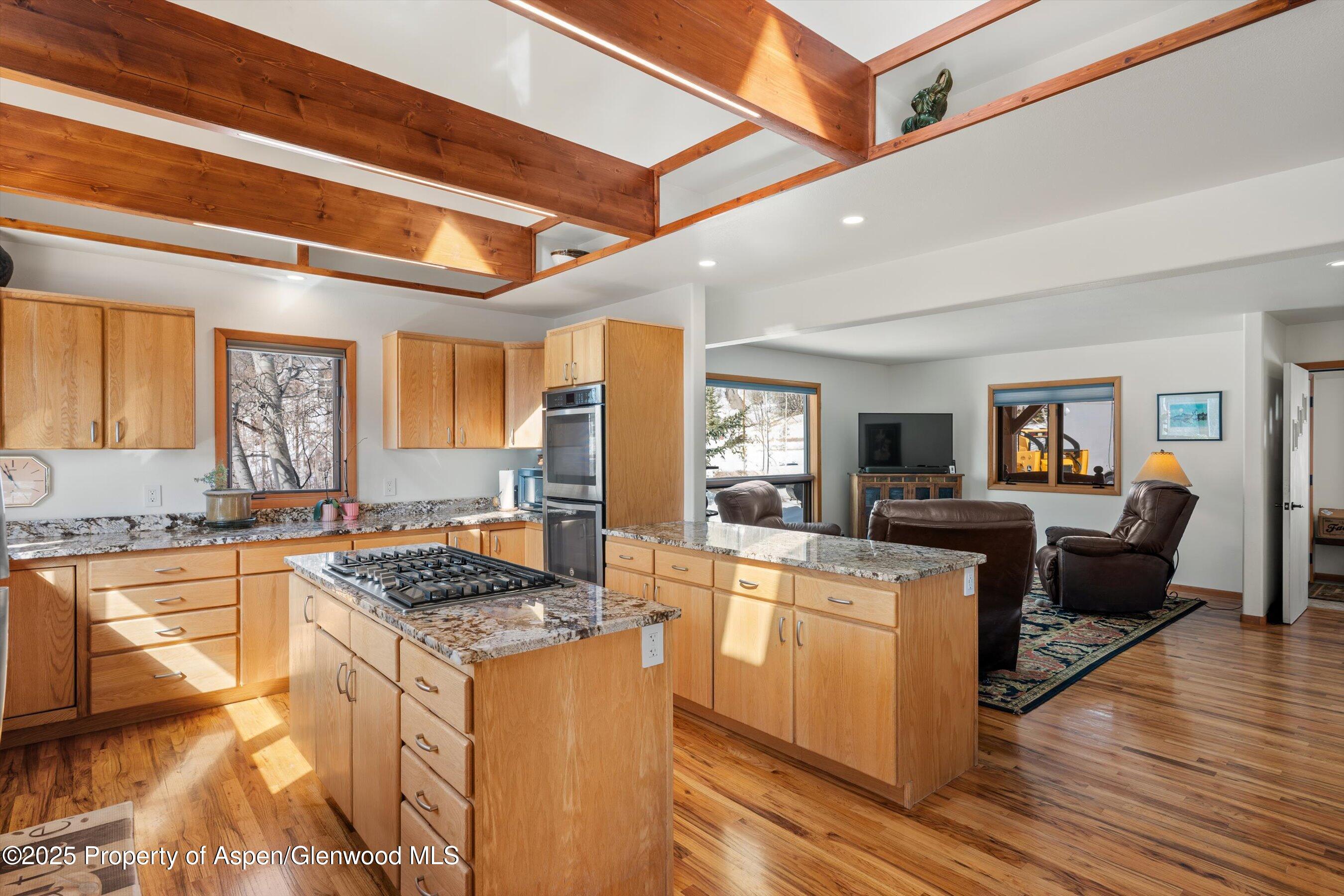 238 Hawk Lane Basalt, CO 81621 - Photo 12 of 46 a kitchen with counter top space and stove