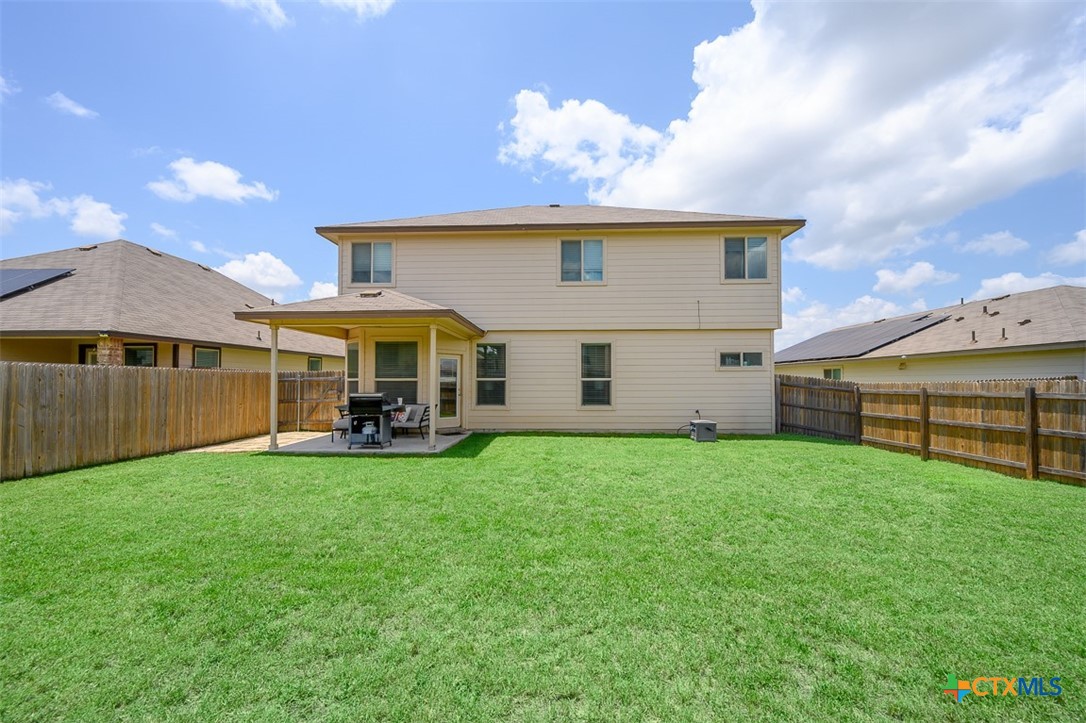 2511 Pintail Loop Copperas Cove, TX 76522 - Photo 25 of 26 a view of a house with a backyard