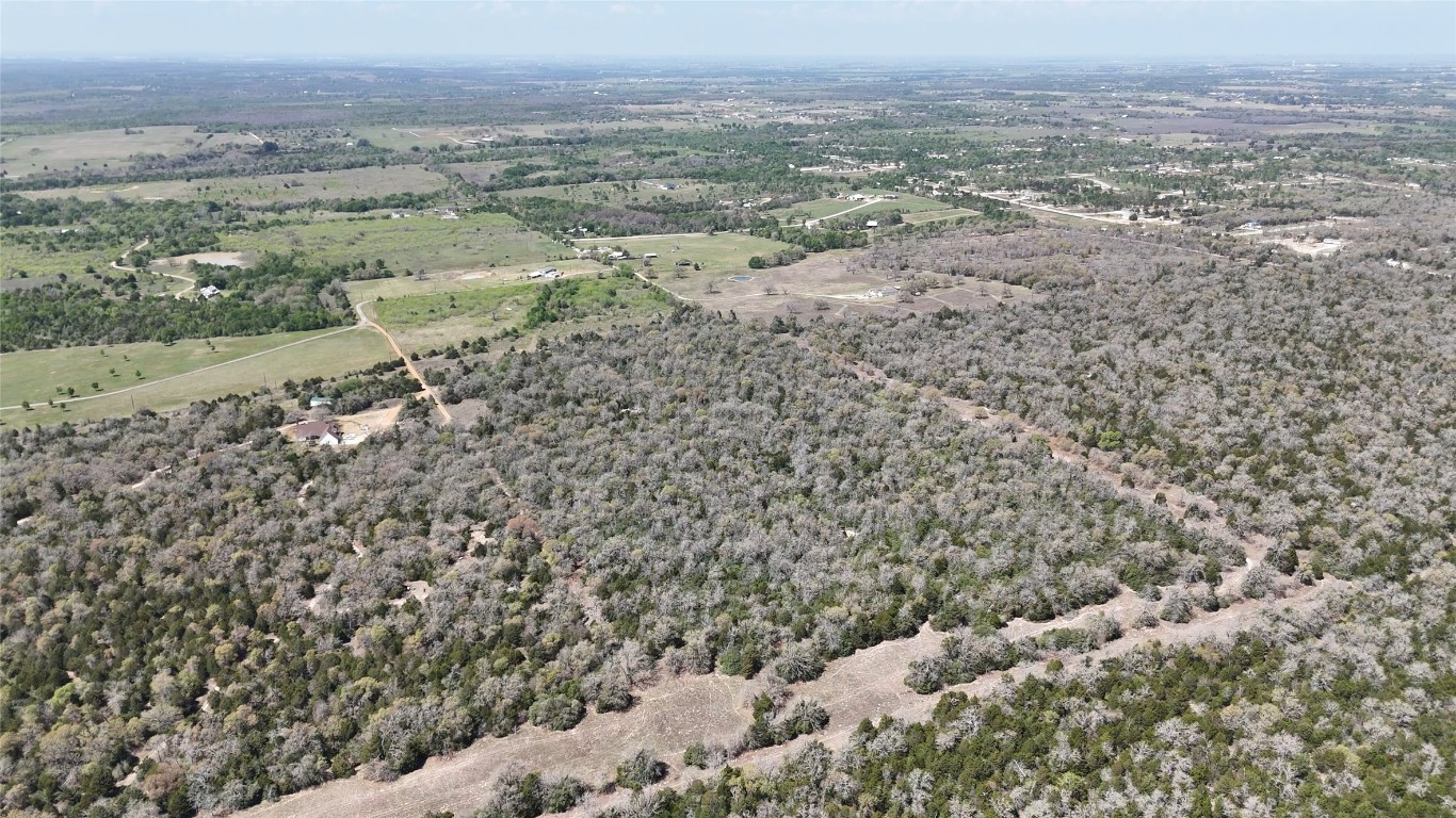 Tbd Wilson Road Elgin, TX 78621 - Photo 6 of 20 an aerial view of house with yard and mountain view in back