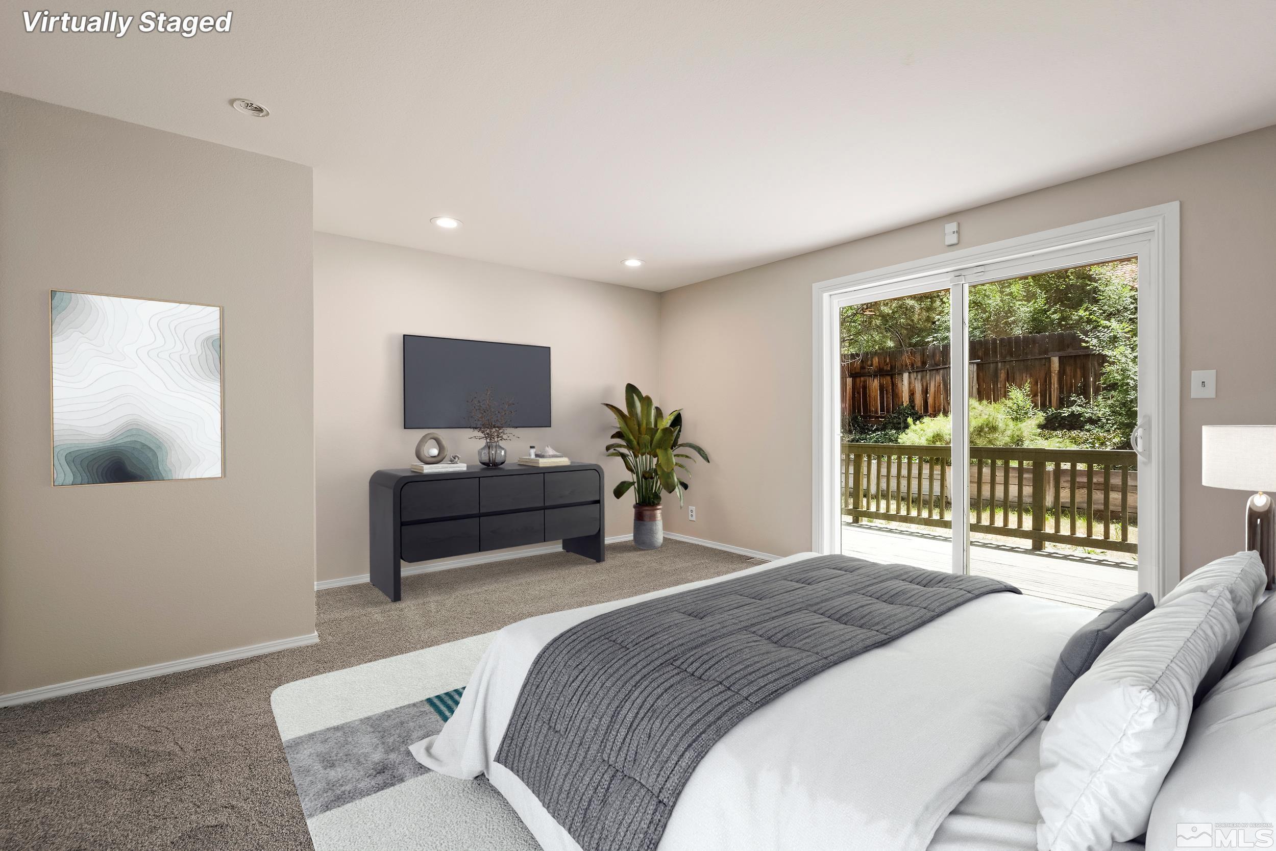 540 Citadel Road Reno, NV 89503 - Photo 15 of 30 a bedroom with a bed and large window