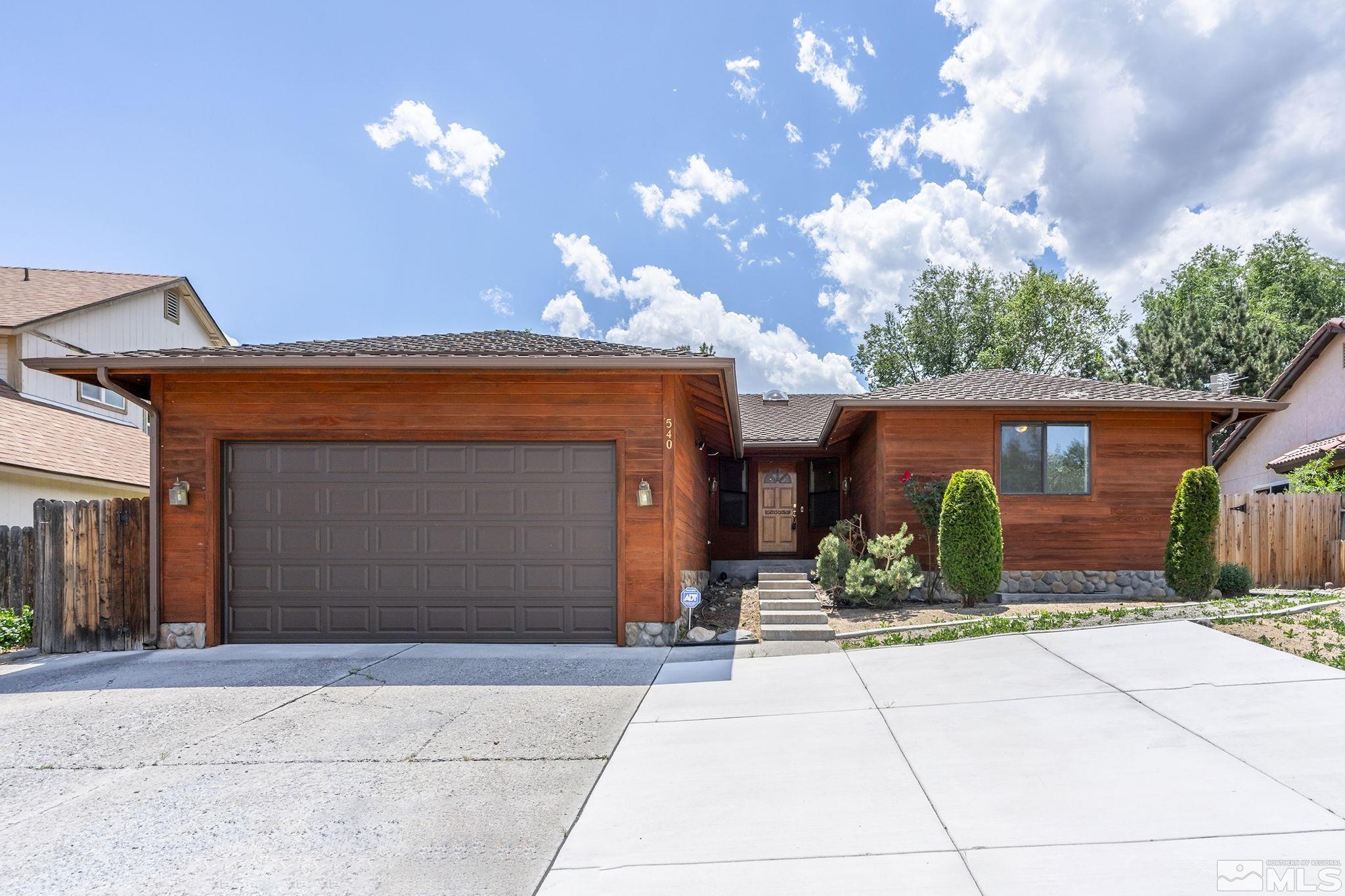 540 Citadel Road Reno, NV 89503 - Photo 2 of 30 front view of a house with a yard