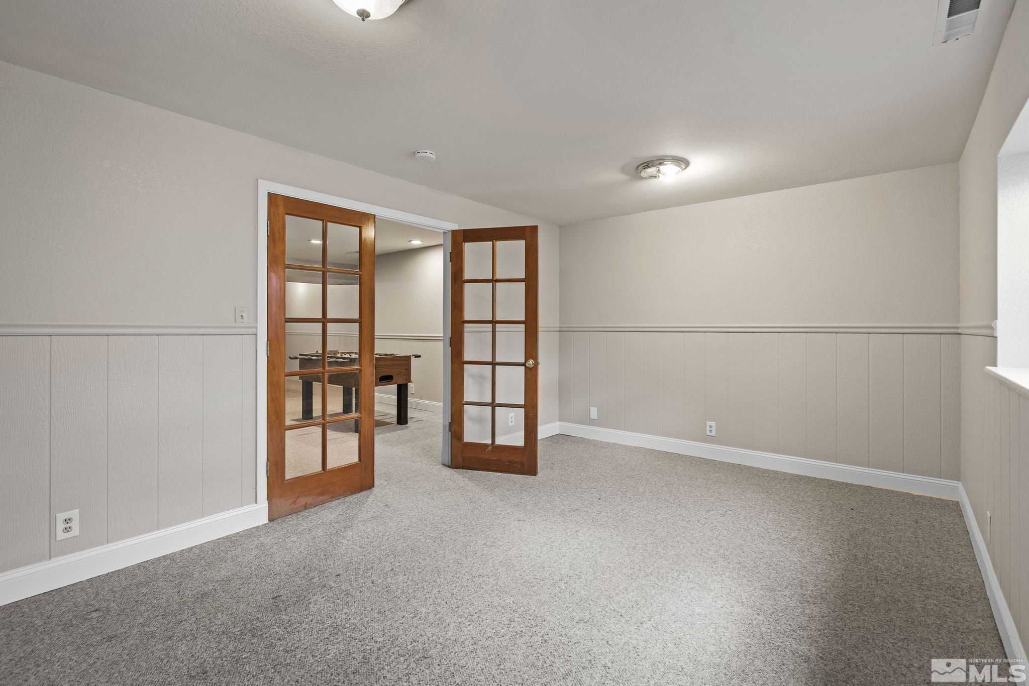 540 Citadel Road Reno, NV 89503 - Photo 21 of 30 an empty room with windows