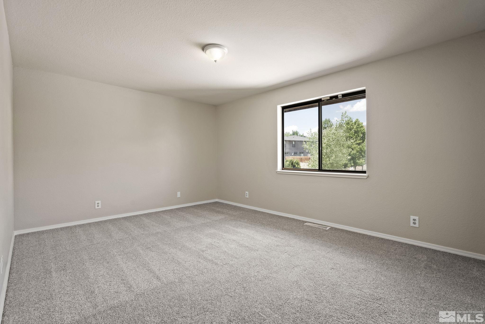 540 Citadel Road Reno, NV 89503 - Photo 25 of 30 an empty room with a window
