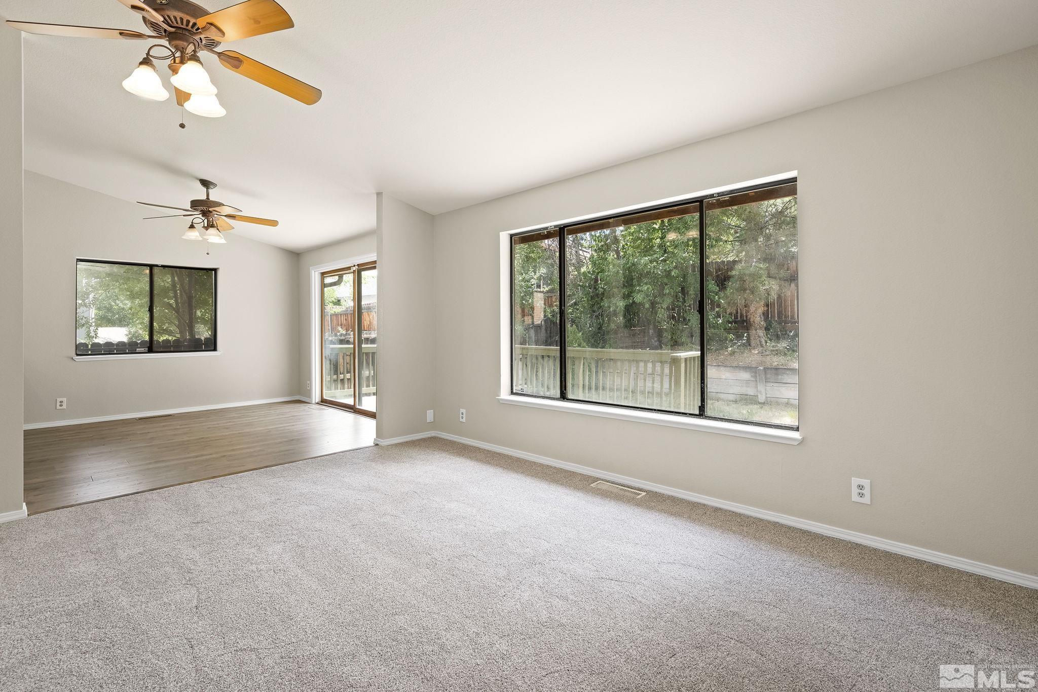 540 Citadel Road Reno, NV 89503 - Photo 6 of 30 a view of a livingroom with a ceiling fan and window
