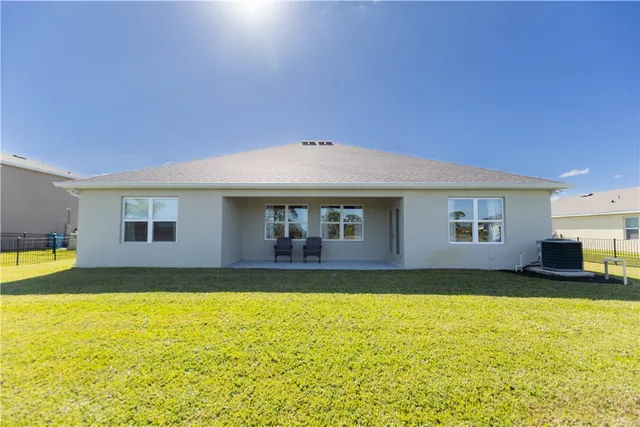 a view of a house with swimming pool