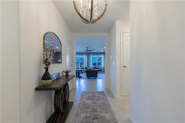 a view of a livingroom with furniture and entryway