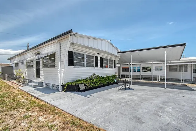 front view of a house with a patio