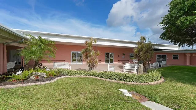 a garden view with a seating space