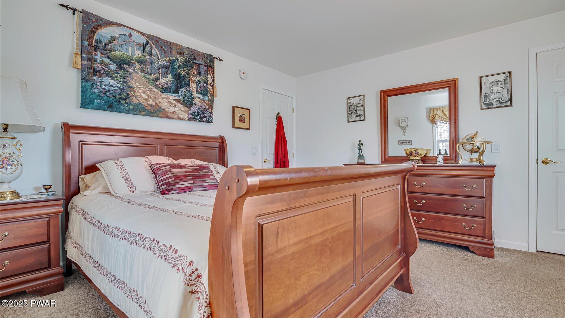 66 Boulder Road Lake Ariel, PA 18436 - Photo 28 of 51 a bedroom with a bed and a dresser