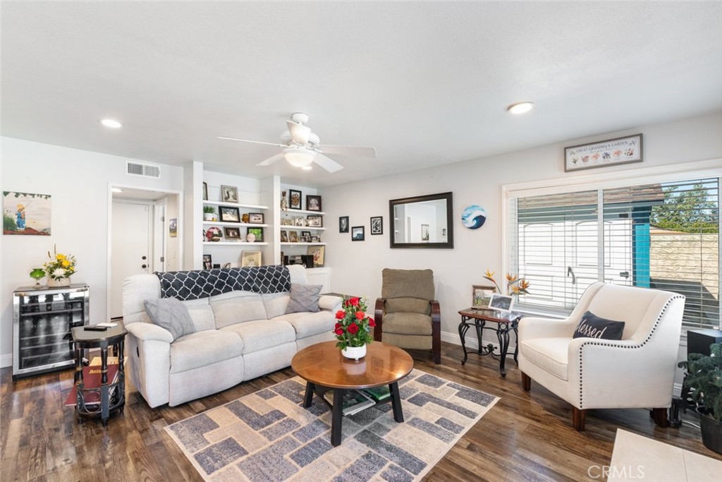 30198 La Primavera Street Temecula, CA 92592 - Photo 14 of 50 a living room with furniture and wooden floor