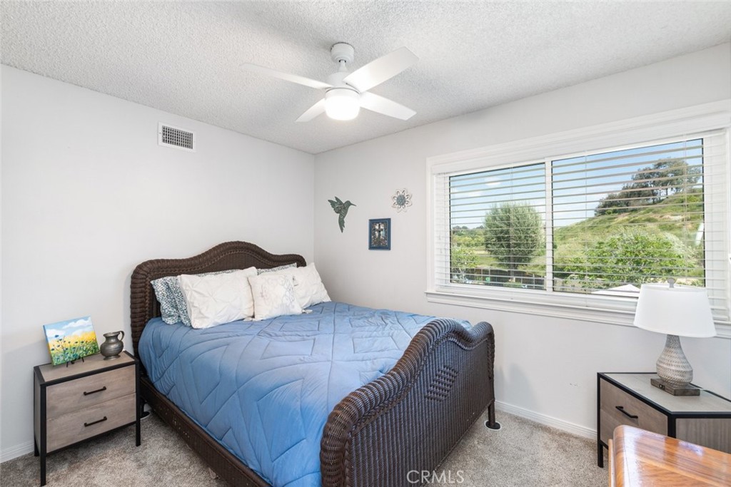 30198 La Primavera Street Temecula, CA 92592 - Photo 22 of 50 a bedroom with a bed and a window