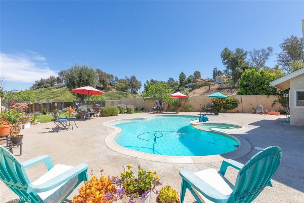30198 La Primavera Street Temecula, CA 92592 - Photo 30 of 50 a view of a swimming pool with a patio