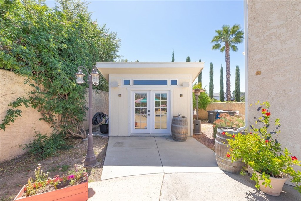 30198 La Primavera Street Temecula, CA 92592 - Photo 32 of 50 a front view of a house with garden