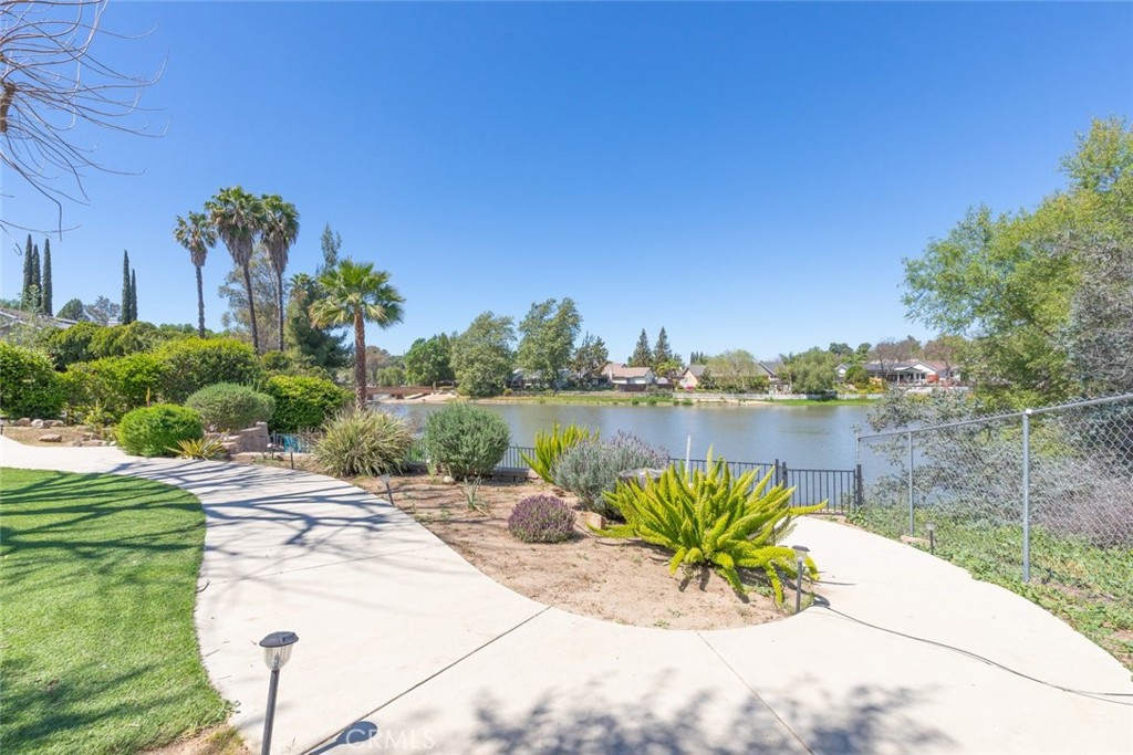 30198 La Primavera Street Temecula, CA 92592 - Photo 39 of 50 a view of a lake with a table and a chair