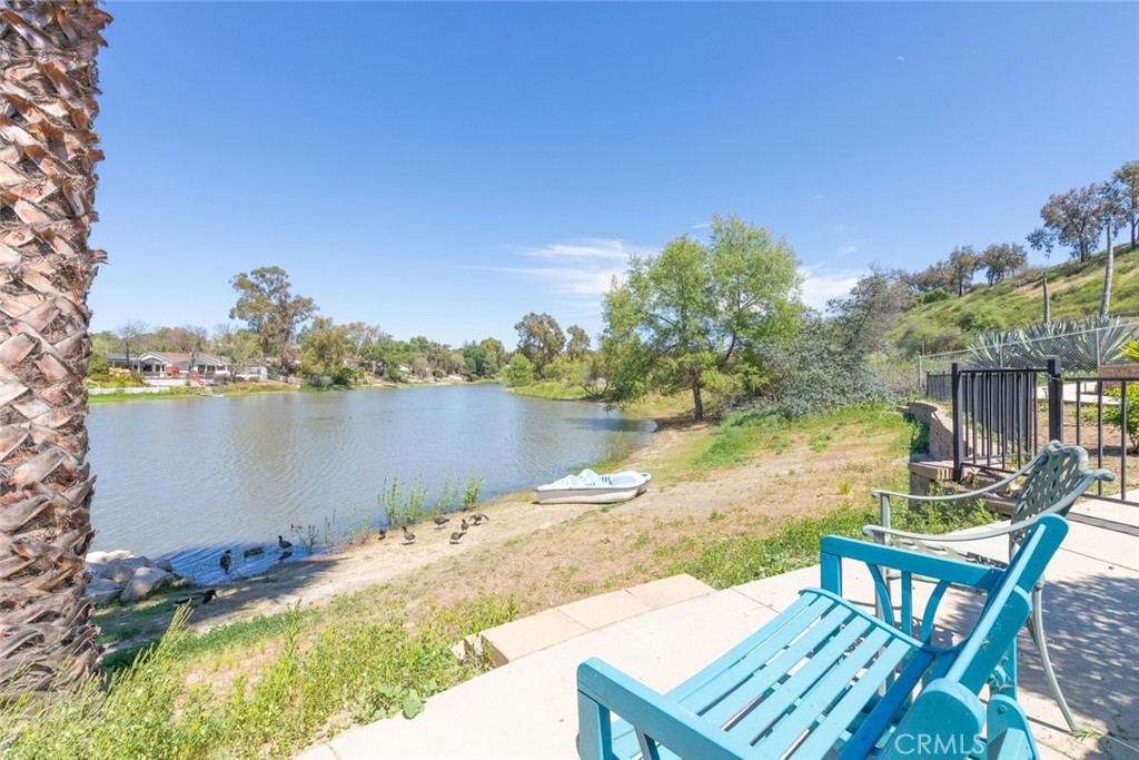 30198 La Primavera Street Temecula, CA 92592 - Photo 40 of 50 a view of a lake with couches chairs