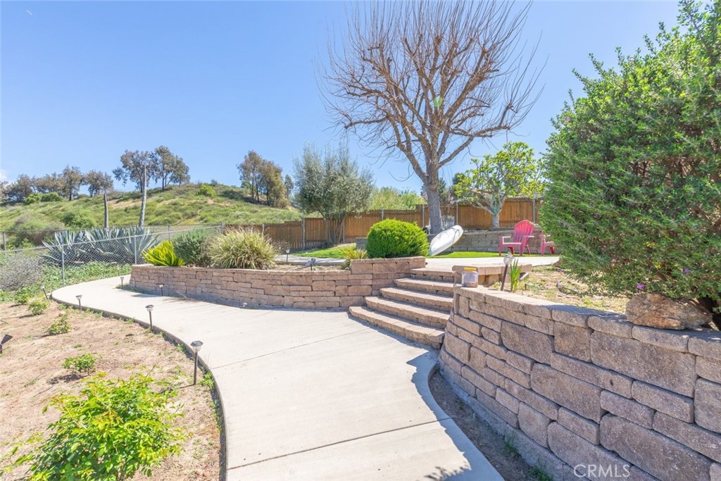 30198 La Primavera Street Temecula, CA 92592 - Photo 42 of 50 a view of a garden with an outdoor space