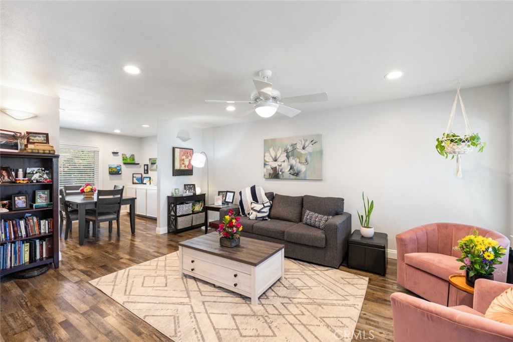 30198 La Primavera Street Temecula, CA 92592 - Photo 6 of 50 a living room with furniture and wooden floor