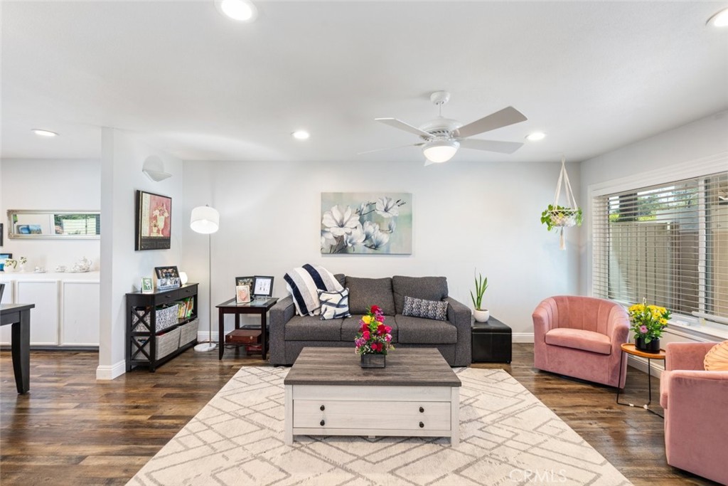 30198 La Primavera Street Temecula, CA 92592 - Photo 8 of 50 a living room with furniture and wooden floor