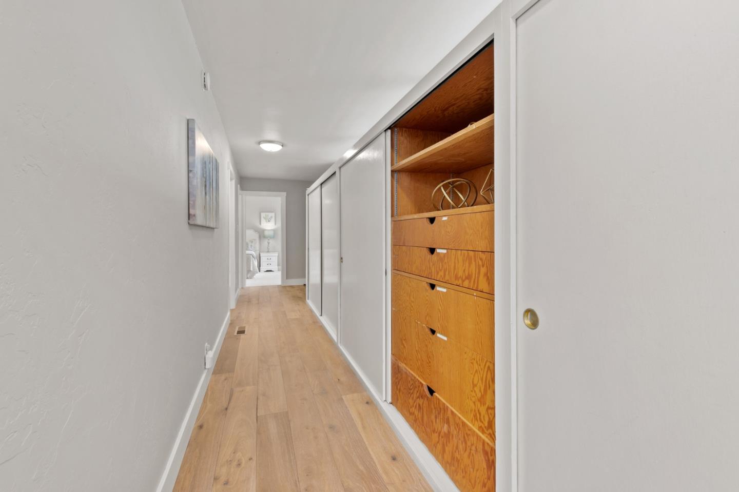 30 Knollcrest Road Hillsborough, CA 94010 - Photo 17 of 33 a view of a hallway with wooden floor and staircase