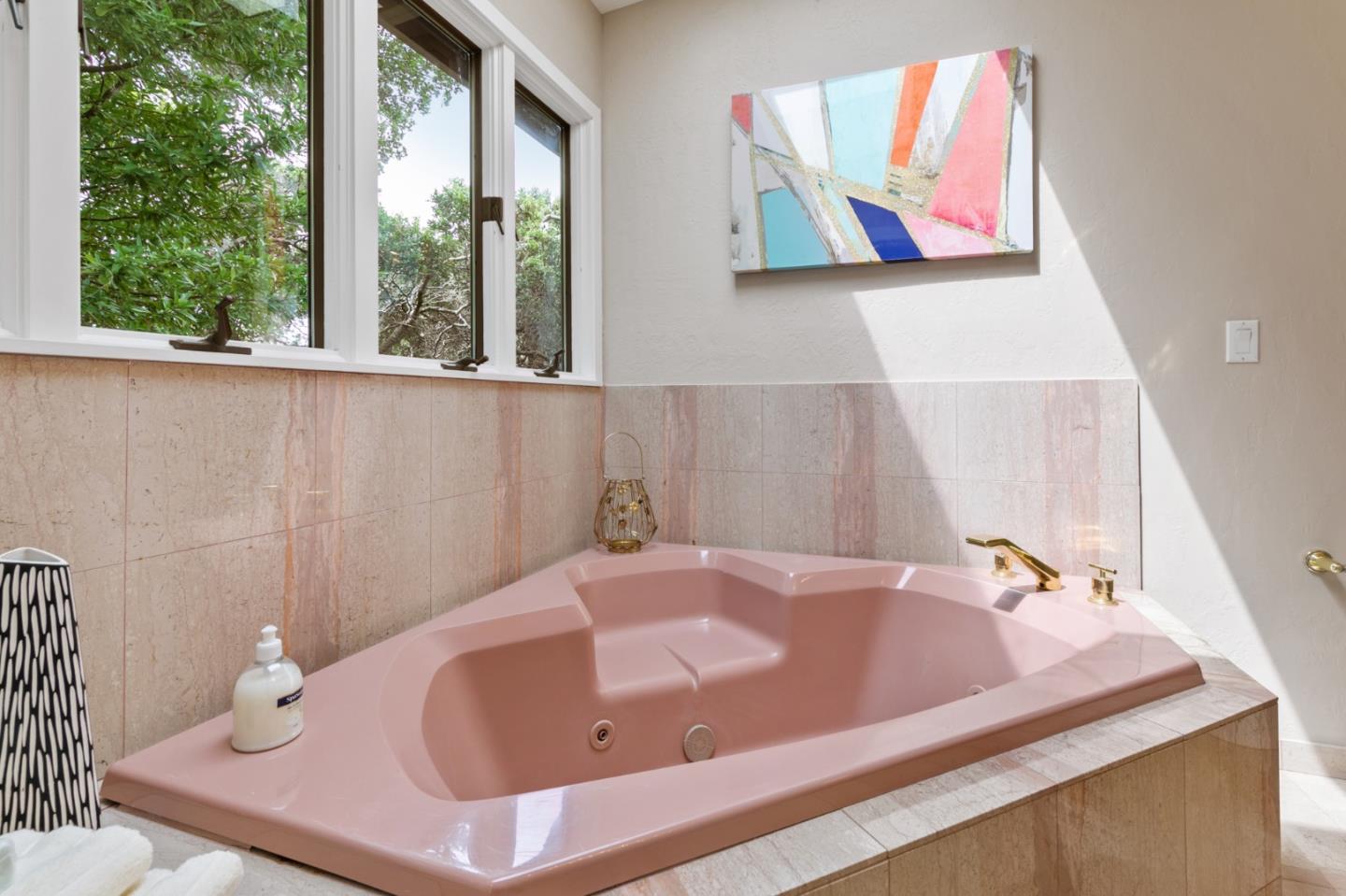 30 Knollcrest Road Hillsborough, CA 94010 - Photo 20 of 33 a bathroom with a bathtub and a window