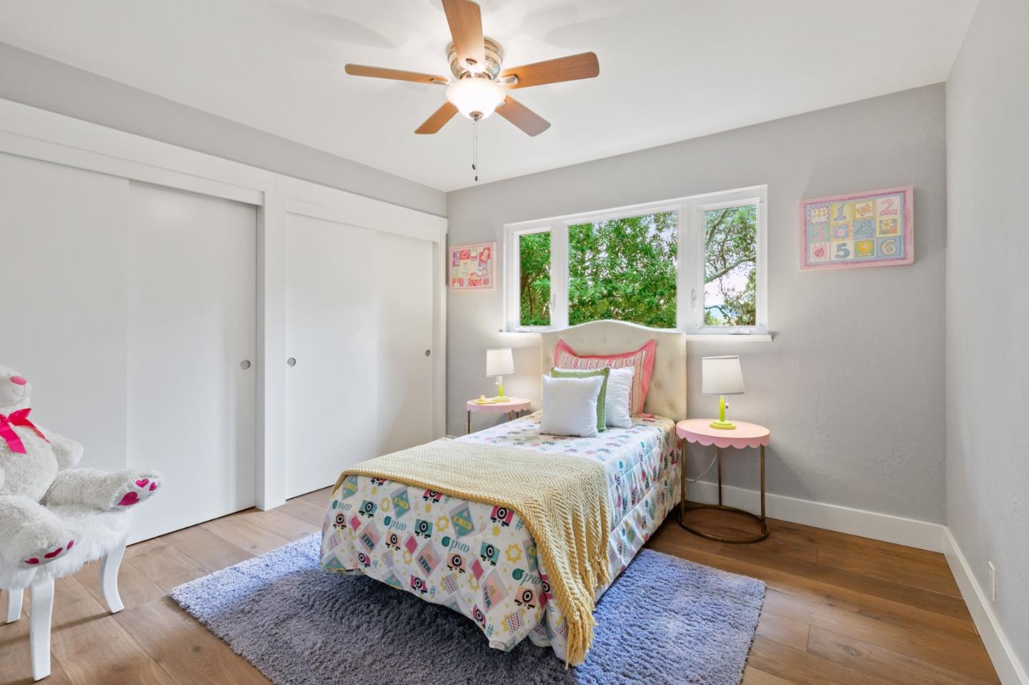 30 Knollcrest Road Hillsborough, CA 94010 - Photo 21 of 33 a bedroom with a bed a chandelier and a window