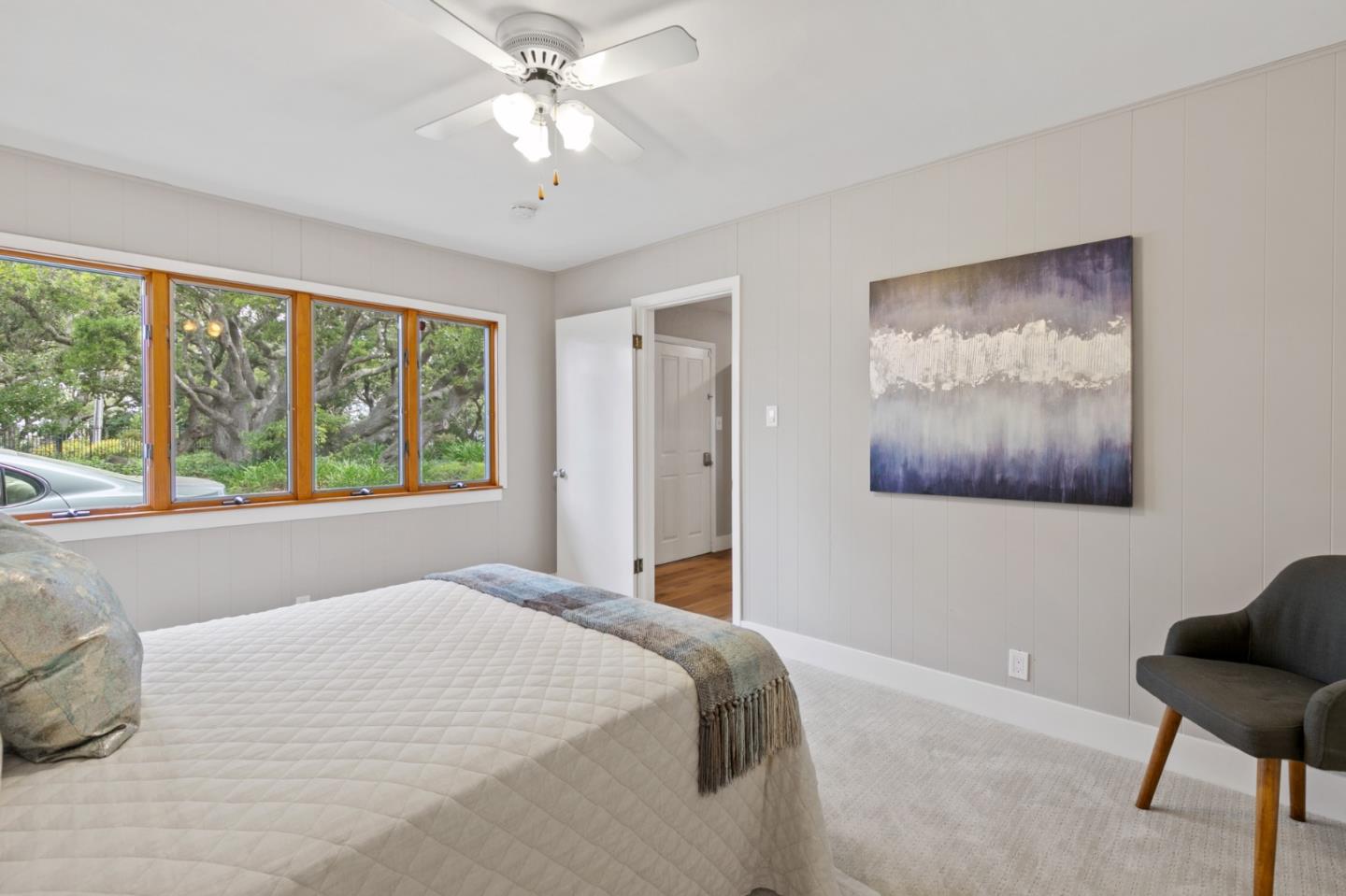 30 Knollcrest Road Hillsborough, CA 94010 - Photo 23 of 33 a bedroom with a large bed and a window