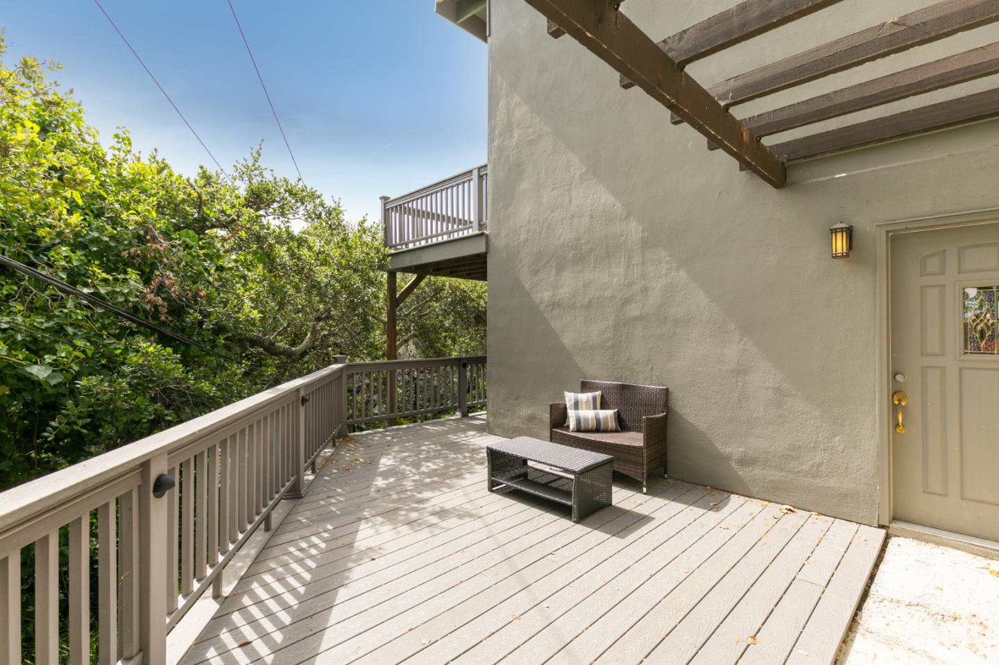 30 Knollcrest Road Hillsborough, CA 94010 - Photo 31 of 33 a balcony with wooden floor table and chair