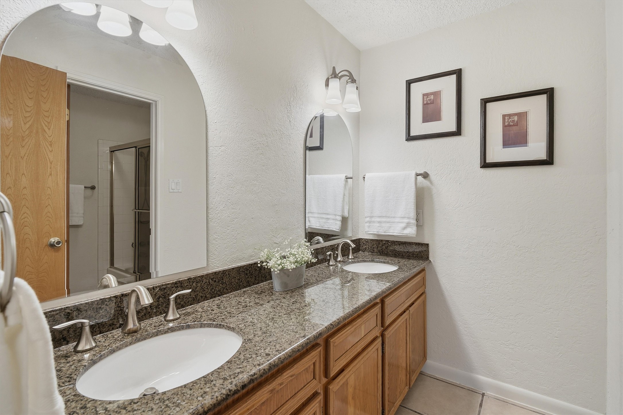 15015 Pleasant Valley Road Houston, TX 77062 - Photo 19 of 21 a bathroom with double sink and a mirror